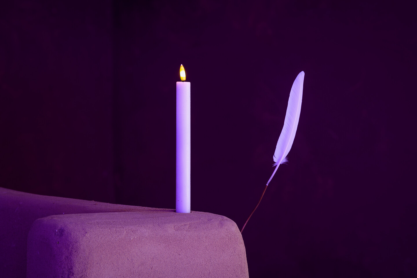 (Ka) pheko ye... (Kgoro 1), 2023, clay, reflective matt, tin foil, paper, stones, flowers (clay), candle, stickers, photo print, wire, feather, charcoal