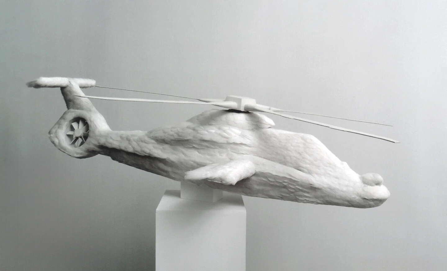 Comanche, 2006, Apache Helicopter in plaster, wooden plinth, 175 x 190 x 40 cm