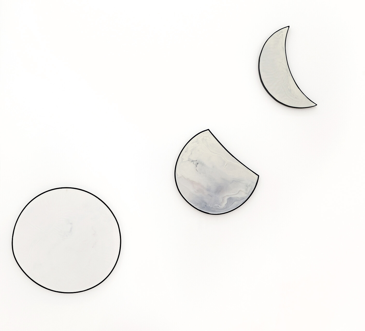 Moon(s), 2024, Beeswax, oil paint on iron and wood, ⌀ 60 cm (full moon), 45 x 40 cm (waxing gibbous), 46 x 33 cm (waning crescent)