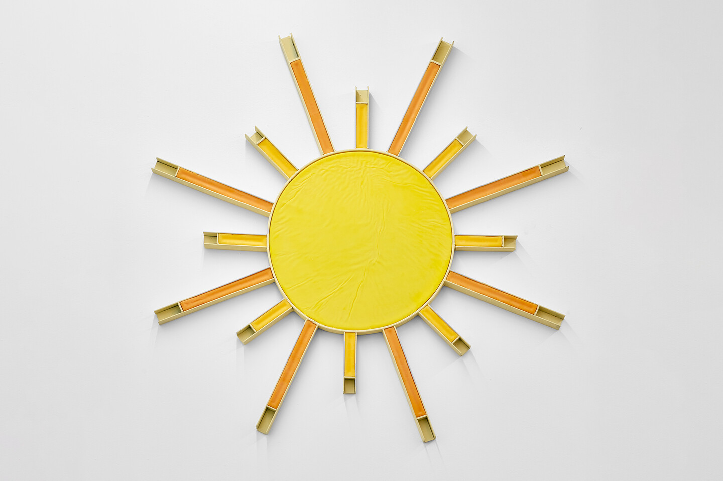 Sun 2, 2024, Beeswax, oil paint on iron and wood, &oslash; 105 cm