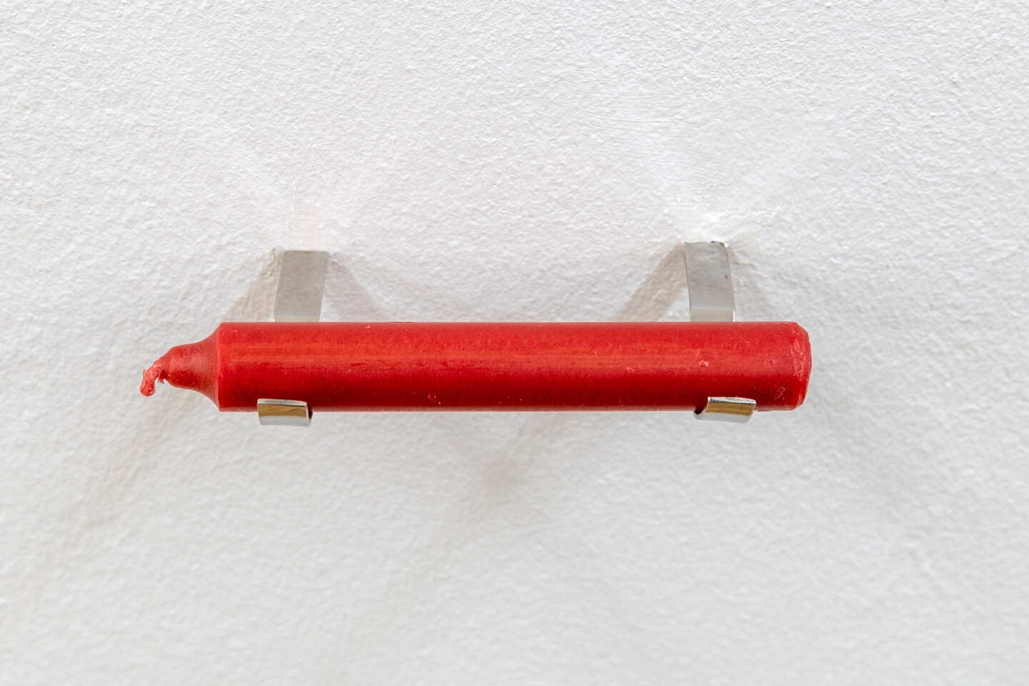 Sung Tieu, An Old Flame, 2022, Candle from VEB Wittol Wittenberg, metal fixing 10,5 cm (length), 1 cm diameter, Unique