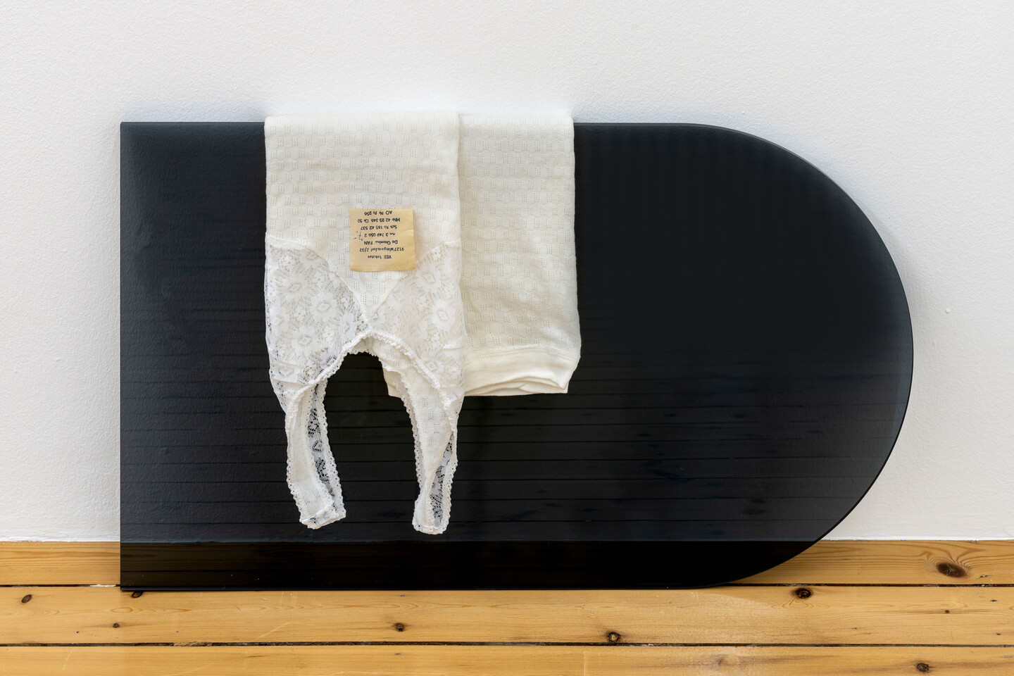 Sung Tieu, Rest In Power, 2022, Underwear from VEB Trikotex Wittgensdorf, perspex sheet, 45 x 75 cm, Unique